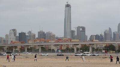 A game of cricket in Al Furjan. Pawan Singh / The National
