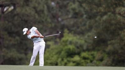 Hideki Matsuyama of Japan hits from the fairway on the fifteenth hole. EPA