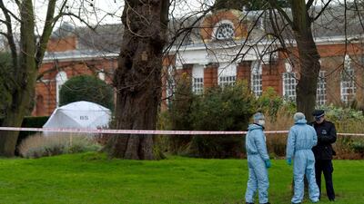 Forensics officers at Kensington Gardens after a man died from setting himself on fire. Ben Pruchnie / Getty Images
