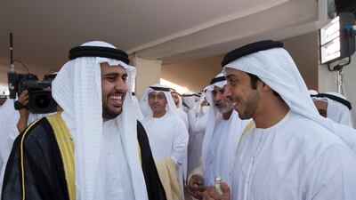 Sheikh Diab greets Sheikh Mansour bin Zayed, the Minister of Presidential Affairs, right, during his wedding reception. Ryan Carter / Crown Prince Court - Abu Dhabi