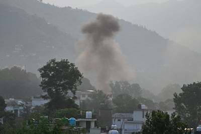 Smoke rises in the main town of Poonch district. India fired missiles at Pakistani territory early on May 7, killing at least eight people, according to Pakistan. AFP