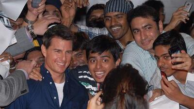 Tom Cruise poses in Mumbai. Divyakant Solanki / EPA