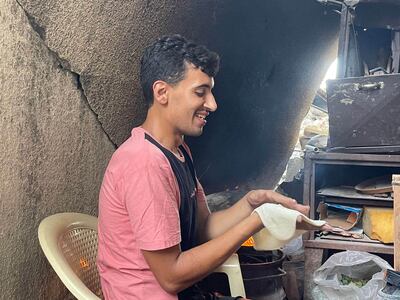 Mohammed Isleem bakes at home when the daily queue at the bakery is too long. Photo: Mohammed Abu Doon
