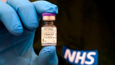 File photo: A vial of the Pfizer-BioNTech COVID-19 vaccine is held as preparations are made at a mass vaccination hub, the Centre For Life in Newcastle-upon-Tyne, in north-east England. AFP