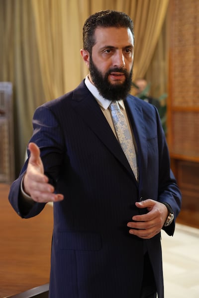 Syrian President Ahmad Al Shara addresses the press in Damascus after signing a ceasefire agreement with the SDF on January 18. The deal includes a handover of Deir Ezzor and Raqqa regions to government control, and full integration of SDF fighters into state institutions. Getty Images