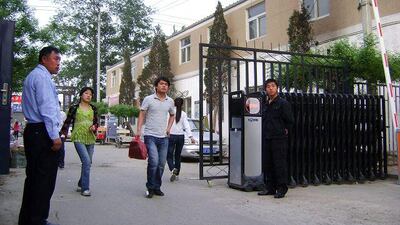 Barriers and security guards have been put in place at the entrances to Laosanyu village.