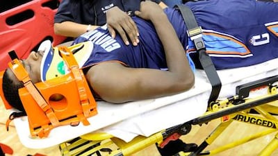 Michael Kidd-Gilchrist is stretchered off against Houston Rockets.