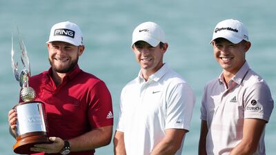 Tyrrell Hatton, Rory McIlroy, and Collin Morikawa at the Yas Links Golf Course on Tuesday. Getty
