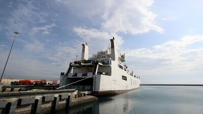 A ship carrying humanitarian aid for Gaza leaves the UAE's Fujairah, February 2024. Chris Whiteoak / The National