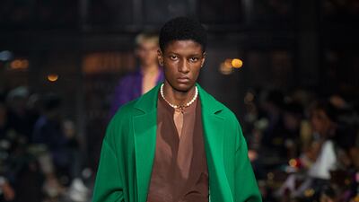 A men's caped look from the Valentino spring/summer 2022 show