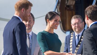For her flight to Ireland, Meghan chose a chic Givenchy sweater and pencil skirt in racing green, which was the essence of laid back elegance. Getty Images