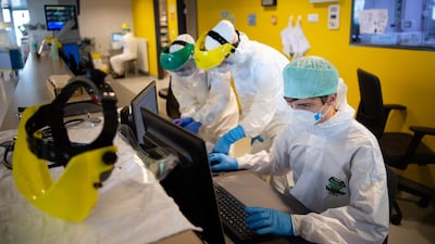 A nurse from the ICU encodes data from patients suffering from Covid-19. The intensive care unit at the University Hospital of Charleroi is struggling with an increase of patients suffering from Covid-19. Getty Images