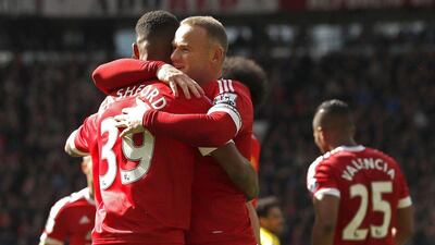 Marcus Rashford celebrates with Wayne Rooney after scoring the first goal for Manchester United. Action Images via Reuters / Jason Cairnduff