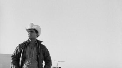Abu Dhabi. Iranian foreign worker at Abu Dhabi airport. This airport is now Al Bateen Executive Airport