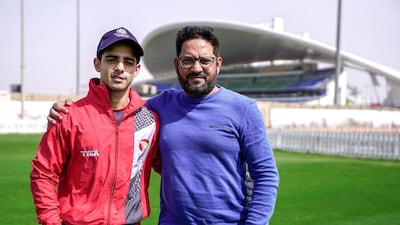 Mohammed Riyan with his father Zaheer, who is also the manager of Etihad Airways cricket team. Victor Besa / The National