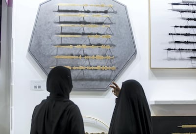 Sara Alharbali's artworks display the sound waves of Abdul Basit Abdul Samad’s recitations in steel finished with gold leafing or a black powder coat. Leslie Pableo / The National