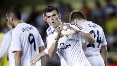 Garet Balem scored before being substituted on the hour mark in his debut match for Real Madrid. Alberto Saiz / AP Photo