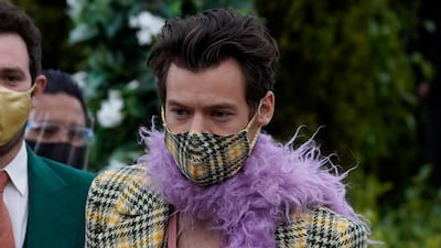 Harry Styles wore Gucci for his red carpet arrival as well as performance. AP