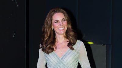 The Duchess of Cambridge wears a metallic light green Missoni midi dress, with Gianvito Rossi 105 Pumps and Kiki McDonough Green Amethyst Diamond Earrings. EPA