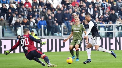 Cristiano Ronaldo on his way to scoring his first goal. EPA