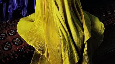 Woman in canary burqa, 2002. Copyright ©Steve McCurry / Magnum Photos