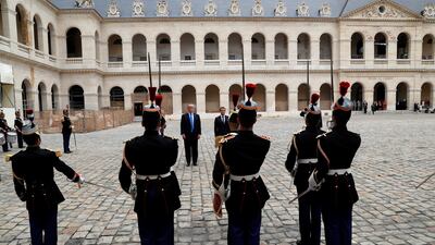 Emmanuel Macron and Donald Trump in Paris yesterday. Yves Herman / Reuters