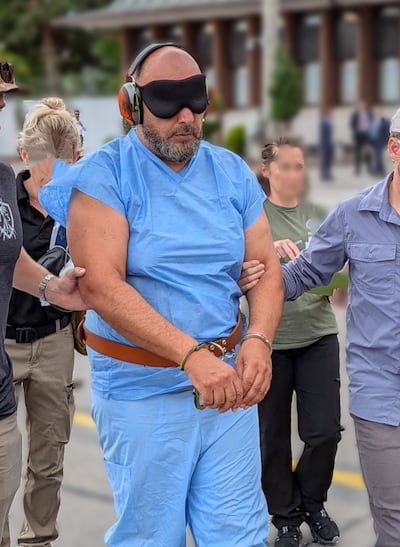 A photo released by the FBI shows Mr Hilmi leaving Turkey, where he was detained. Photo: FBI / X