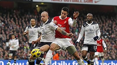 Robin van Persie, centre, will be looking to add to his haul of 12 Premier League goals for Arsenal against Tottenham tonight.