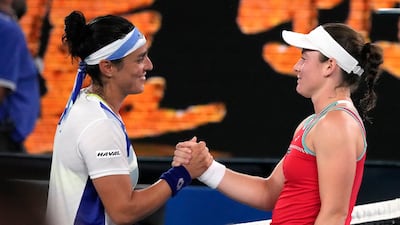 Ons Jabeur is congratulated by Tamara Zidansek at Melbourne Park. AP
