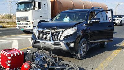 A rider was seriously injured after his motorcycle was struck from behind by a driver who failed to maintain safe distance. Photo: Dubai Police