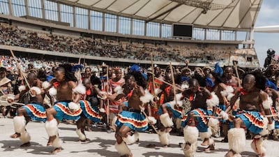 Men from Swaziland perform a dance to celebrate King Misuzulu Zulu's coronation at the Moses Mabhida Stadium in Durban. AFP