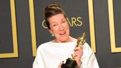 British costume designer Jacqueline Durran poses in the press room with the Oscar for Best Costume Design for "Little Women". AFP