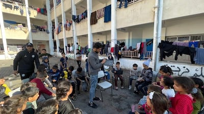 English teacher Tariq Al Annabi during an English lesson for displaced Palestinian children in Rafah. Photo: Nagham Mohanna