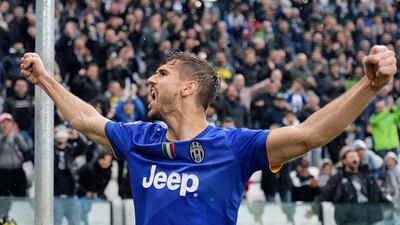 Juventus striker Fernando Llorente celebrates after scoring one of his two goals in his side's 7-0 win over Parma on Sunday in Turin. Alessandro Di Marco / EPA / November 9, 2014