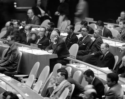 An all-male contingent of ambassadors listen to a debate at the United Nations General Assembly meeting in 1956. There are more women today but diplomacy remains male-dominated. AP