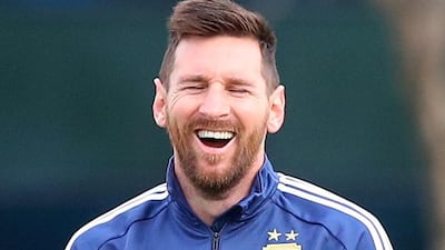 Argentina's Lionel Messi laughs during training. Reuters