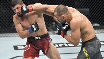Davi Ramos, right, of Brazil punches Arman Tsarukyan of Armenia in their lightweight bout during the UFC Fight Night event inside Flash Forum on UFC Fight Island in Yas Island, Abu Dhabi.