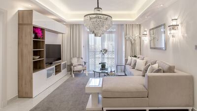 Discrete spotlights have been placed into ceiling bulkheads and feature chandeliers have been added. Olympio Bongat Jr