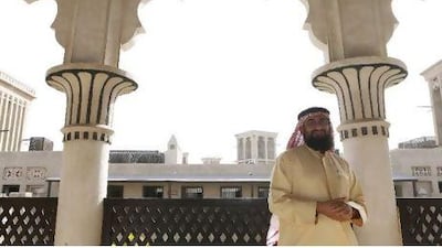 Rashad Bukhash, the chairman of the UAE Architectural Heritage Society, in Bastakiya, home to some of the best preserved examples of Emirati architecture. Jeffrey E Biteng / The National