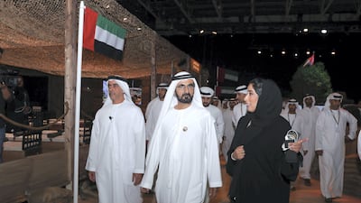 Sheikh Mohammed bin Rashid, Vice President and Ruler of Dubai, Sheikh Saif bin Zayed, Deputy Prime Minister and Minister of Interior and Mona Al Marri, chief executive of the Dubai Media Office, tour the Emirates Media Forum on Monday. Wam