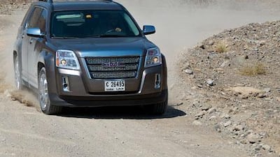 The GMC Terrain’s sporty handling can make the drive to Wadi Kitnah more like an off-road rally.