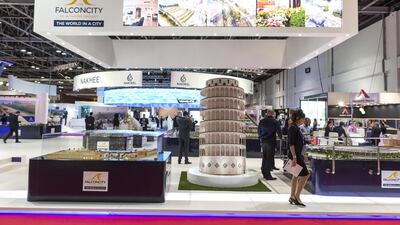 Above, the Falconcity of Wonders stand at Cityscape Global 2015 in Dubai. The development is now split into 69 different sectors with sub developers in charge of various projects across the park. Antonie Robertson / The National
