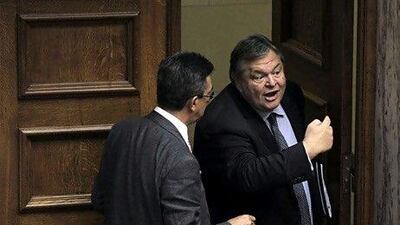 Evangelos Venizelos, right, the Greek finance minister said yesterday that Greece would stay in the eurozone 'for ever'. Louisa Gouliamaki / AFP