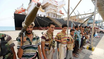 Members of the Houthi movement are seen during withdrawal from Saleef port in Hodeidah province, Yemen May 11, 2019. Picture taken May 11, 2019. Reuters