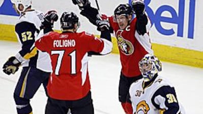 Ottawa Senators celebrate a goal against Buffalo Sabres.