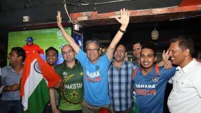 Indian and Pakistani cricket fans at the Time Cafe in Ramee Royal hotel in Dubai.
