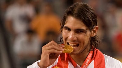 Rafael Nadal celebrates with the men's singles Olympics gold medal at the Beijing Games in 2008. EPA
