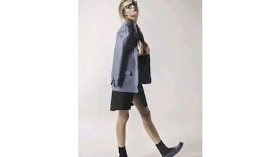 Jacket, Dh1,950, Acne at Boutique 1. Dress, Dh14,675, Calvin Klein. Socks, Dh80, Falke at Harvey Nichols. Shoes, Dh4,428, Louis Vuitton. Spectacles, Dh1,200, Tom Ford.