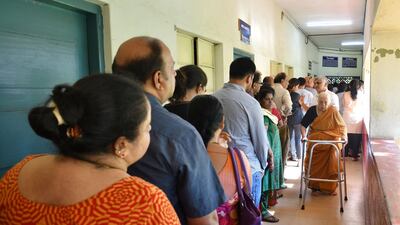 Indian voters line up to cast their ballot in Bengaluru. AFP