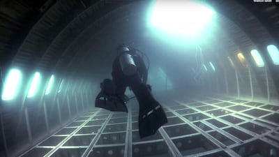 A diver explores the sunken Boeing 747 at Dive Bahrain. Courtesy Padi